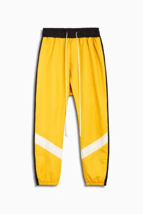 parachute track pant ii / yellow   black   ivory